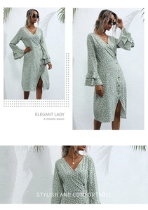 Detail of light green floral wrap dress with V-neck and tiered bell sleeves