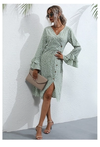 Detail of sage green floral midi dress with V-neckline, button front and ruffled cuffs