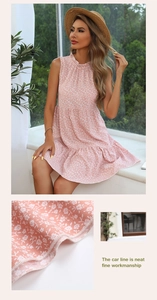 Detailed close-up showing neat stitching and fine workmanship on pink floral summer dress