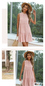 Detail of pink floral sleeveless tiered chiffon dress with ruffled collar and A-line cut