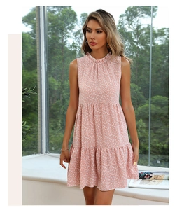 Detailed view of the layered ruffle hem and floral print on the summer sun dress