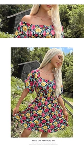 Détail d'une robe d'été fleurie avec manches à volants et imprimé floral coloré