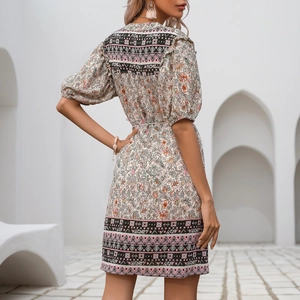 Bohemian floral mini dress with puff sleeves and tie belt in beige and orange print