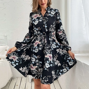 Elegant black long-sleeved floral dress with V-neck and button details for autumn
