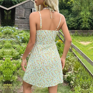 Mini robe d'été dos nu avec imprimé floral vibrant orange et jaune pour femmes
