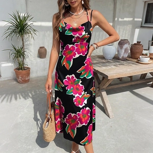 Floral print summer slip dress with cowl neck and open back in a Mediterranean garden
