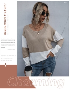 Detail of V-neck hollow out design and khaki color-block splicing on knitted sweater