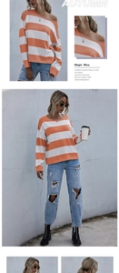 Dettaglio maglione a maglia a righe arancioni e bianche con design a spalle cadenti