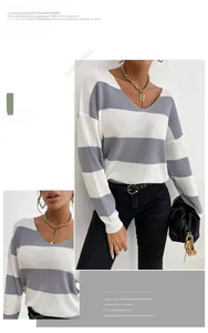 Détail d'un pull à rayures col en V avec manches longues grises et blanches
