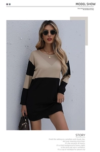 Détail de robe en tricot color-block avec tissage évidé en V et col rond élégant
