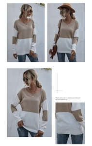 Detail of loose-fit color-block knit sweater featuring V-cut neckline and camel white tones