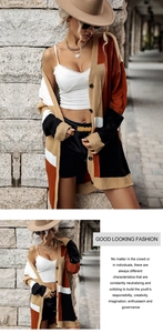 Detail of color-block knit cardigan with buttons and long sleeves in autumn street style