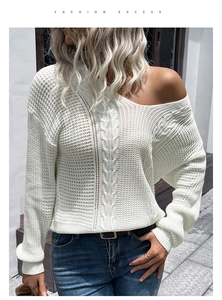 Detail of white cable knit hollow sweater featuring a stylish off-shoulder neckline