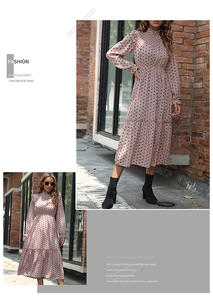 Detail of high neck ruffle collar and black polka dot pattern on mauve chiffon dress