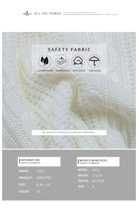 Detail of white cable knit sweater fabric showing soft texture and breathable ribbing