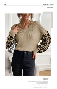 Detail of hollow knit texture and leopard print sleeves on women's khaki sweater