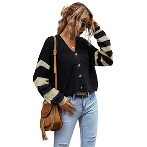 Women's black V-neck knit cardigan with beige striped sleeves and button closure