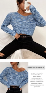Detail of blue and white mixed knit V-neck cropped sweater with chunky ribbed texture