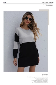 Détail de la robe en tricot avec couleurs contrastées et texture losange évidée au col