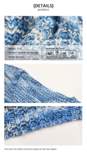 Detail view of the thick knit texture and care label on blue V-neck sweater sleeve