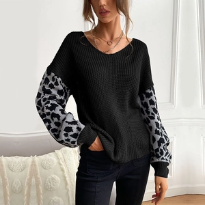 Women's crew neck leopard print patchwork knit sweater with long sleeves in black