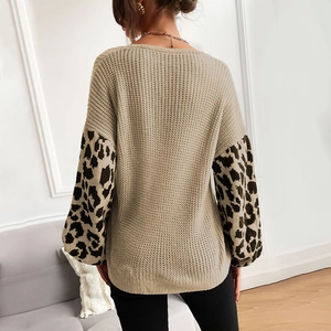 Women's beige knit sweater featuring stylish leopard print patchwork sleeves and relaxed fit