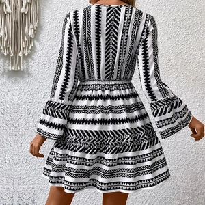 Boho long sleeve dress with black and white tribal print and tiered ruffle hemline