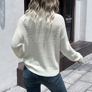 Women's white long sleeve cable knit sweater with hollow out mesh detail back view