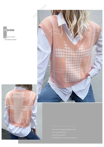 Detail of pink and white houndstooth knitted vest with a deep V-neck and ribbed hem