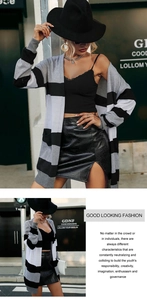 Détail du cardigan en maille rayé gris et noir avec poignets côtelés et texture douce