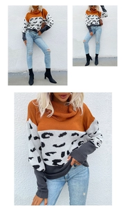 Detail of leopard print stitching and mustard yellow turtleneck on knitted sweater