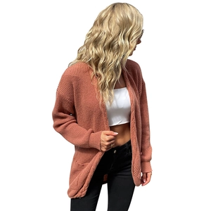 Brick red oversized cable knit cardigan for women with long sleeves and large front pockets