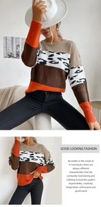 Detail view of leopard print patchwork knit sweater with orange and beige color blocking