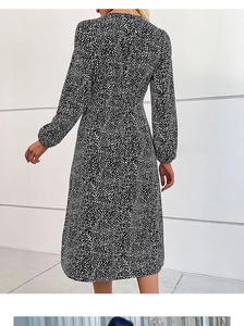 Detail of V-neck back design and polka dot pattern on women long sleeve midi dress
