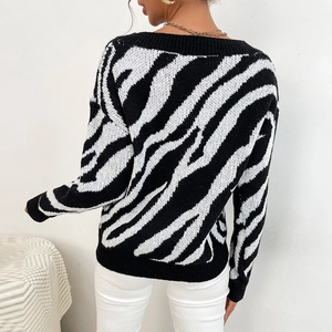 Women's V-neck knit sweater with classic black and white zebra pattern back view