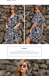 Detail view of V-neck printed mini dress with buttons and functional side pockets