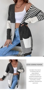 Detailed view of long knit cardigan featuring grey color block and black stripes with pockets