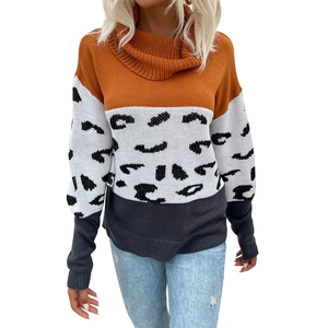 Women's leopard print knit sweater featuring a chic turtleneck and orange-grey color blocking