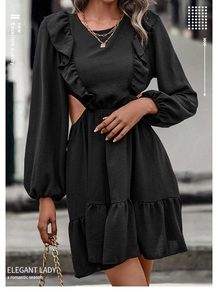 Detail of black V-neck dress with ruffles, waist cutouts and elastic puff sleeves