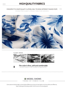 Close-up detail of blue floral daisy print on premium soft cotton fabric dress