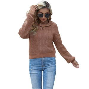 Women's oversized knit hoodie in caramel brown with V-neck button detail and ribbed cuffs