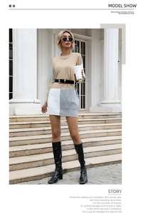 Détail de robe en maille color-block avec ourlet géométrique gris et blanc élégant