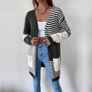 Women's long knit cardigan with grey black and white stripes and functional front pockets