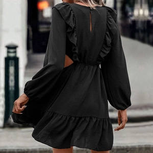 Elegant black long sleeve mini dress with ruffle details and waist cutouts in street style
