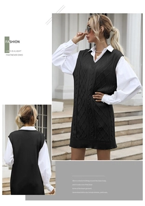 Detail of black cable-knit sweater vest with intricate diamond pattern and V-neckline