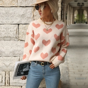Women's knit sweater in cream white with pink heart jacquard pattern and rib knit trim
