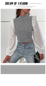 Detail van de pied-de-poule patchwork top met pofmouwen en ruches op de schouders