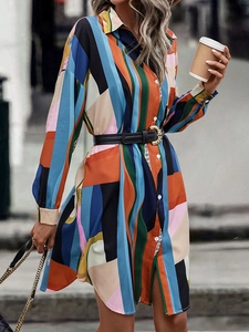 Women's color block shirt dress with geometric print, lapel collar, and waist belt
