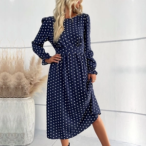 Elegant navy blue polka dot dress with long sleeves and high waist cinched design