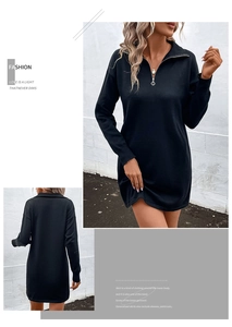 Close-up of black half-zip collar and ribbed cuffs on long sleeve knit mini dress